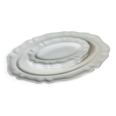 Shaped plates and dishes in Sarreguemines earthenware.