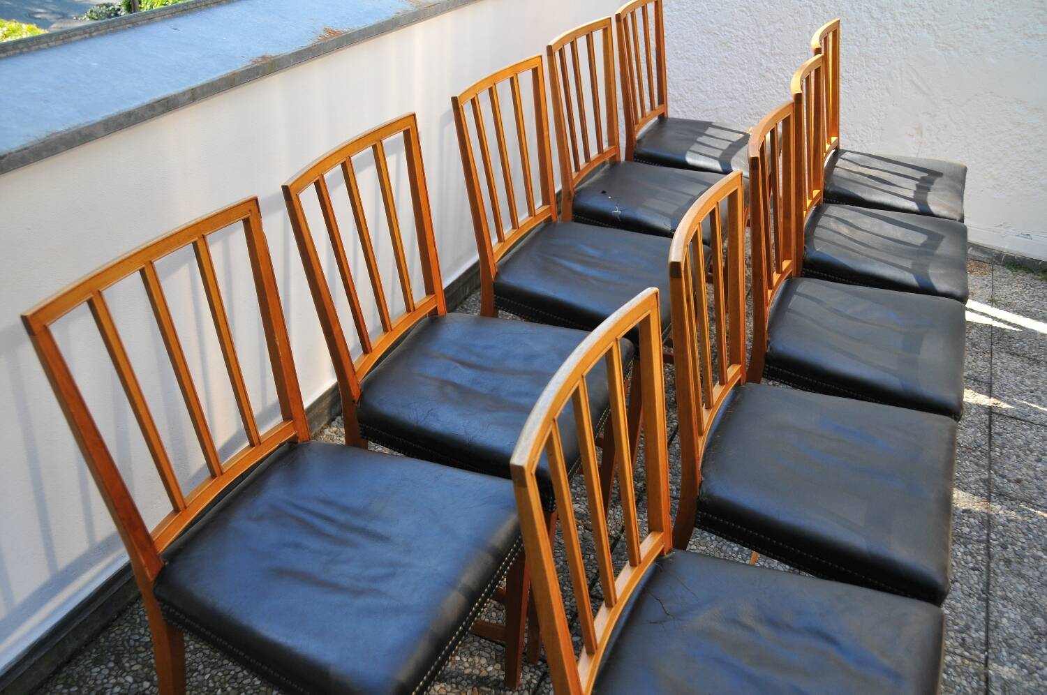10 antique Josef Frank model 620 chairs in walnut wood from Svenskt Tenn.