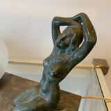 Art Deco lamp with woman and opaline globe on marble