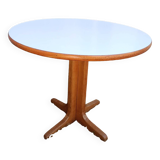 Round table in white formica and wood