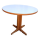 Table ronde en formica blanc et bois