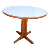 Round table in white formica and wood
