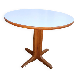 Round table in white formica and wood