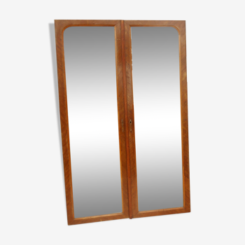 Pair of antique cabinet doors with beveled mirrors