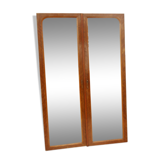 Pair of antique cabinet doors with beveled mirrors