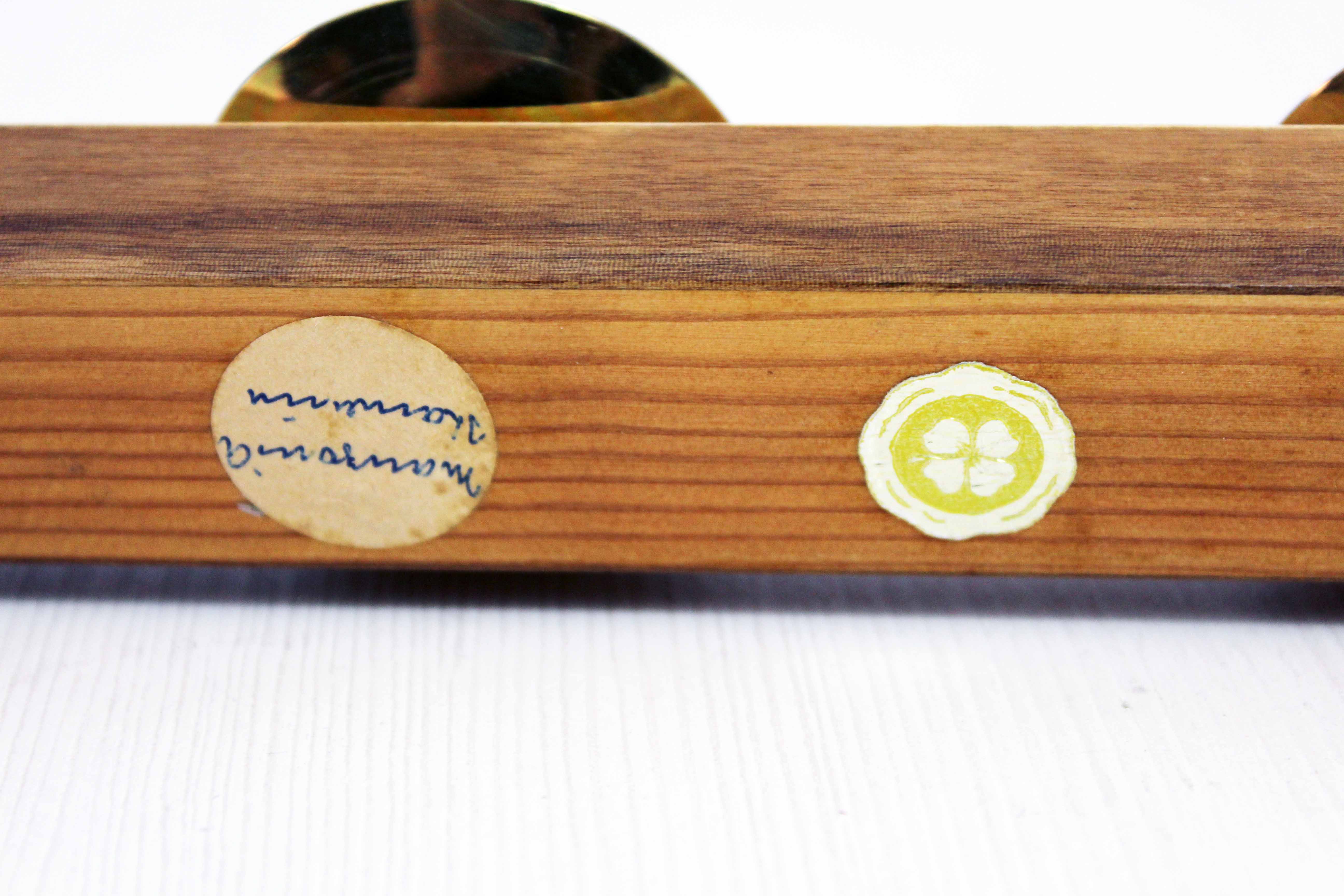 Wooden and brass candle holder