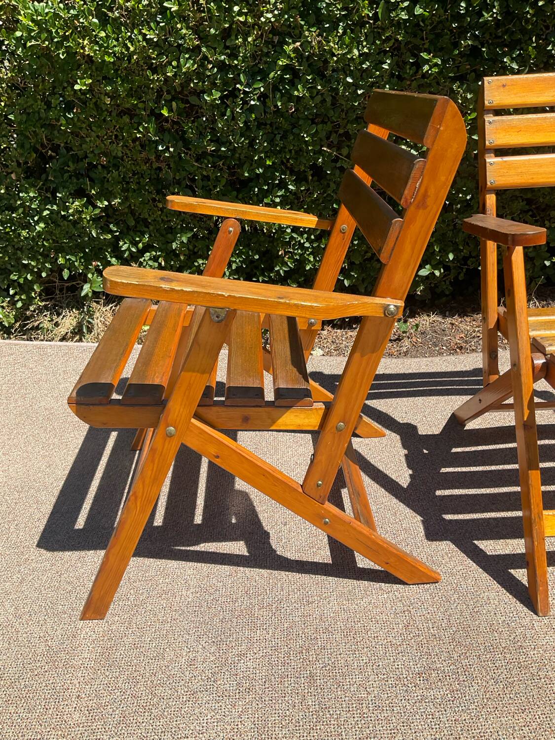 Pair of vintage wooden folding armchairs