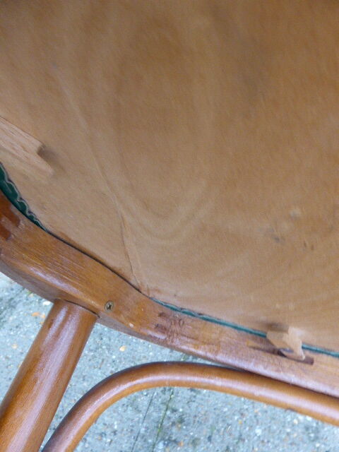 Bar stool in green leather and curved wood