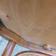 Bar stool in green leather and curved wood