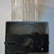 Pair of black lacquered metal, brass and glass wall light