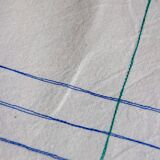Nappe, écru, surpiqûres bleue/verte