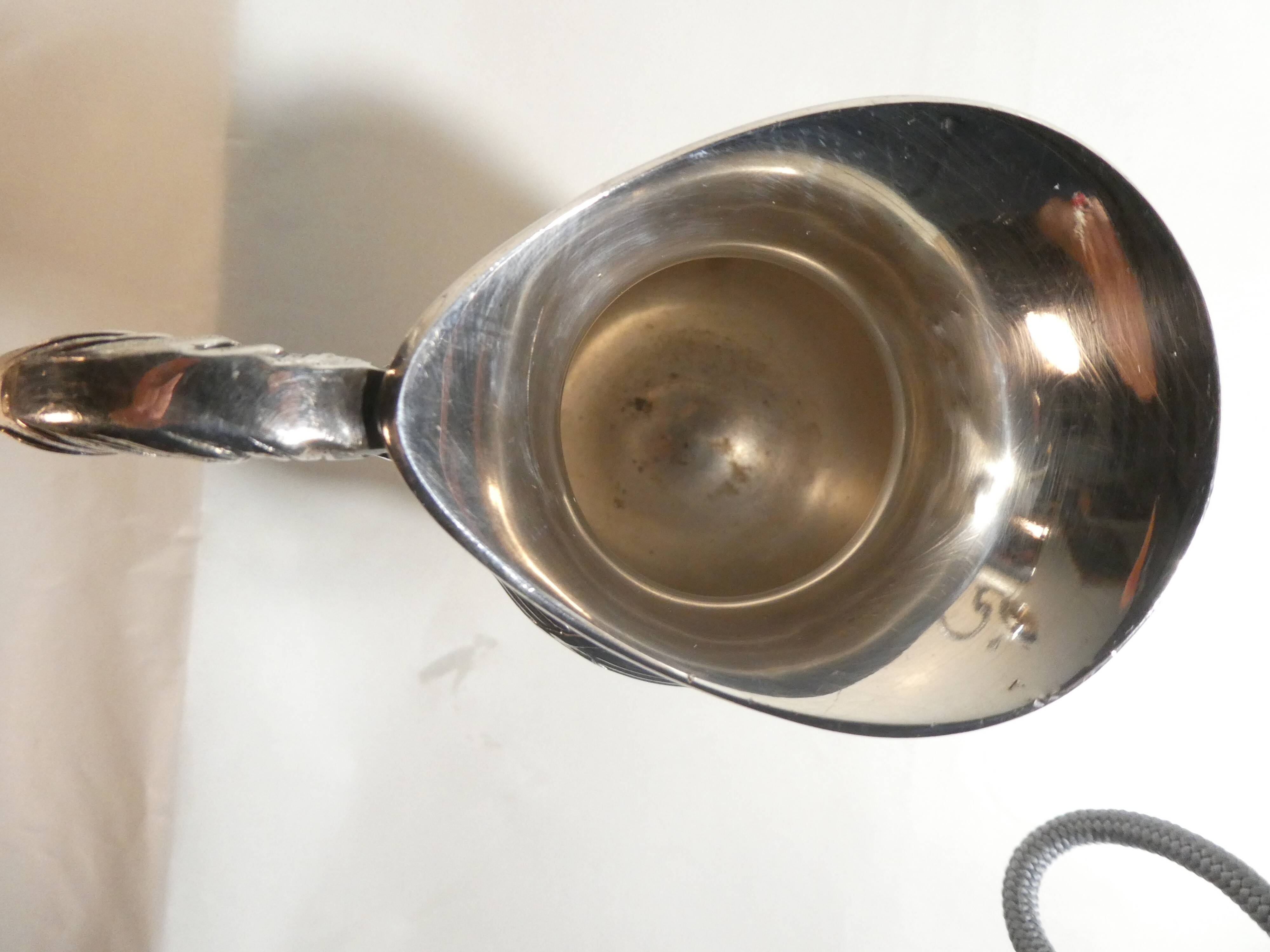 Louis XVI style silver-plated teapot and milk jug