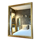 Antique gilded mirror with pearl and gold leaf.