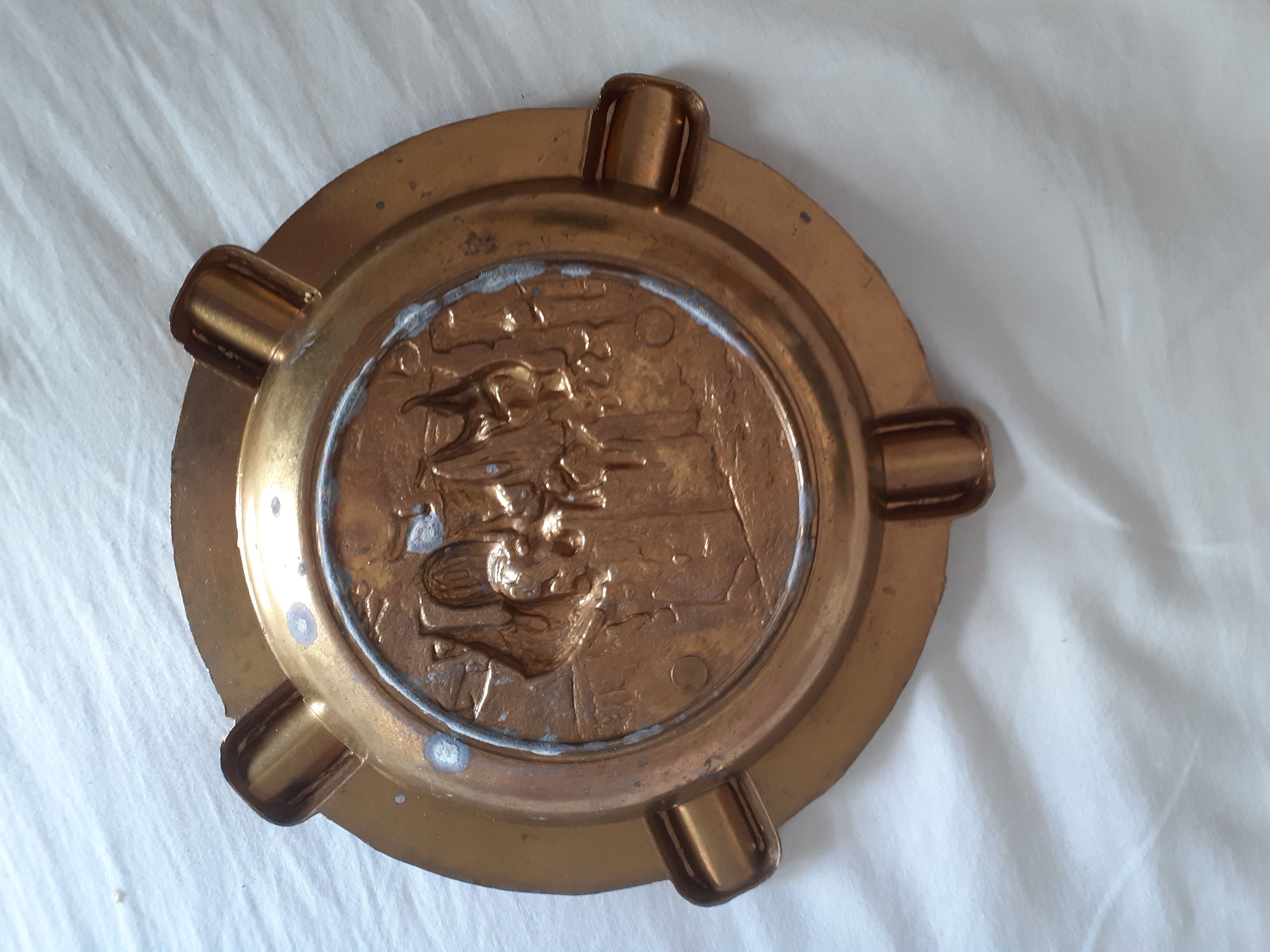 Golden metal ashtray