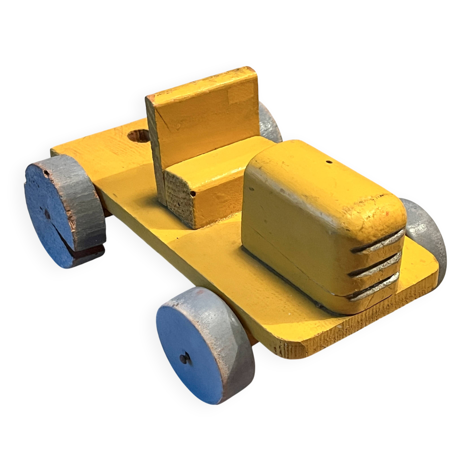 Yellow wooden tractor, antique toy
