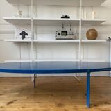 Oval coffee table in blue lacquered wood