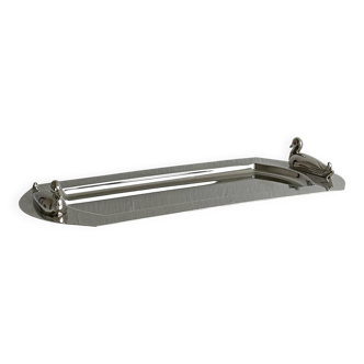 Shiny metal foie gras dish