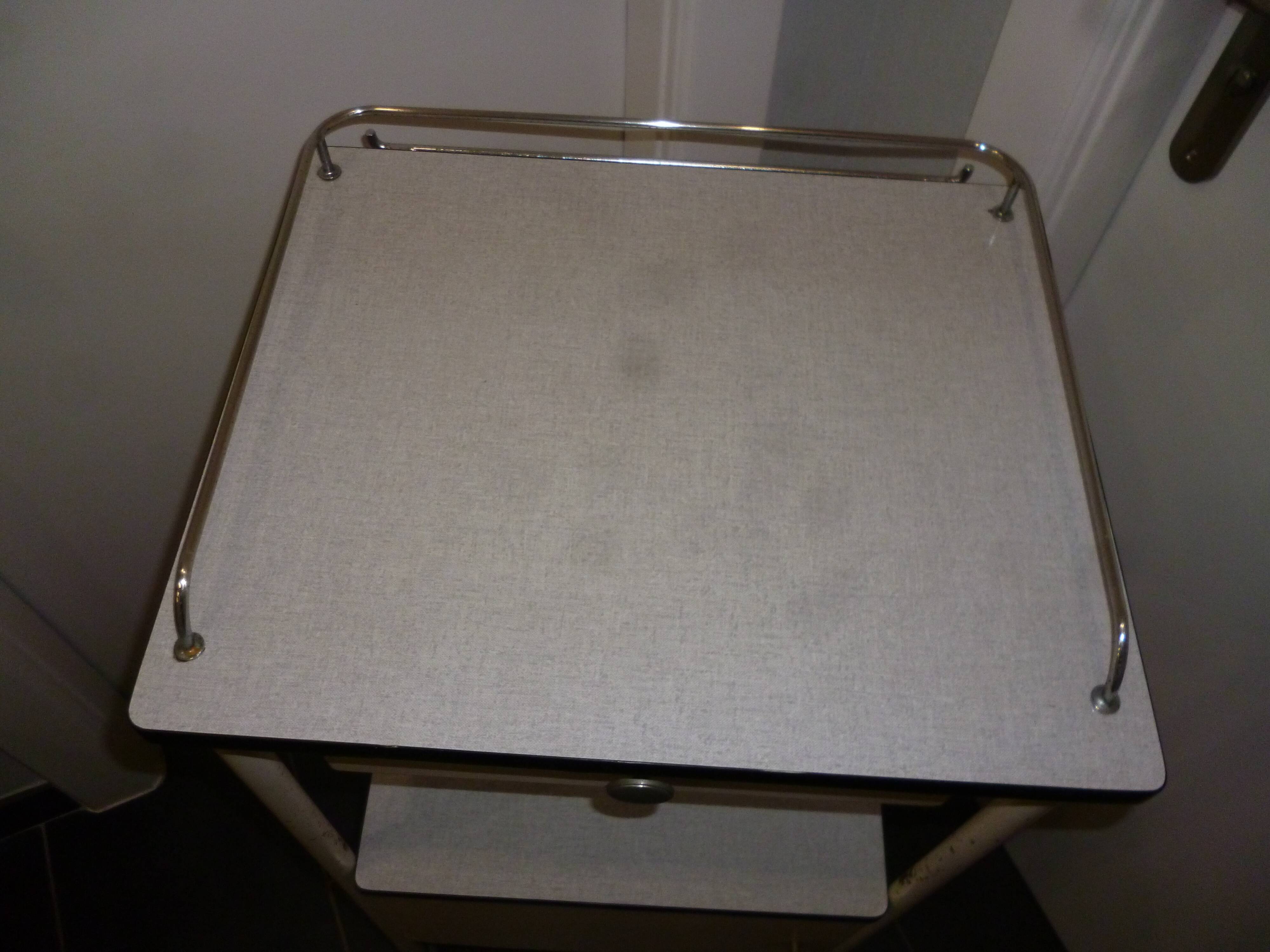 Old bedside on wheels