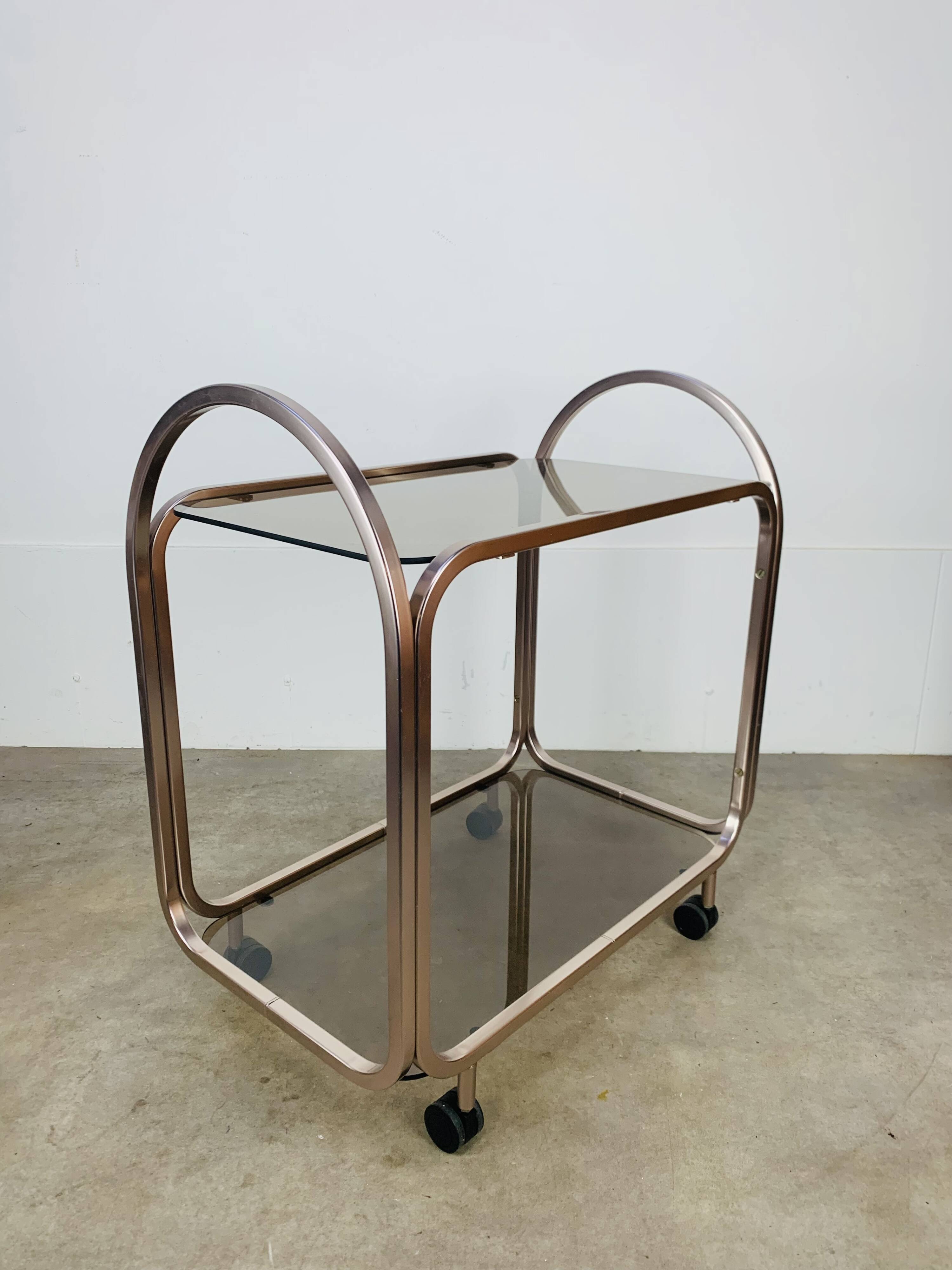 Kaymet dessert trolley in smoked glass and anodised aluminium, 1980s.