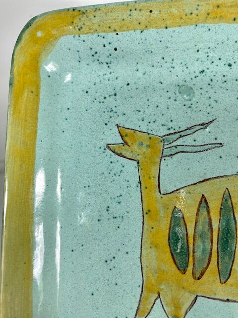 Small handmade glazed clay dish