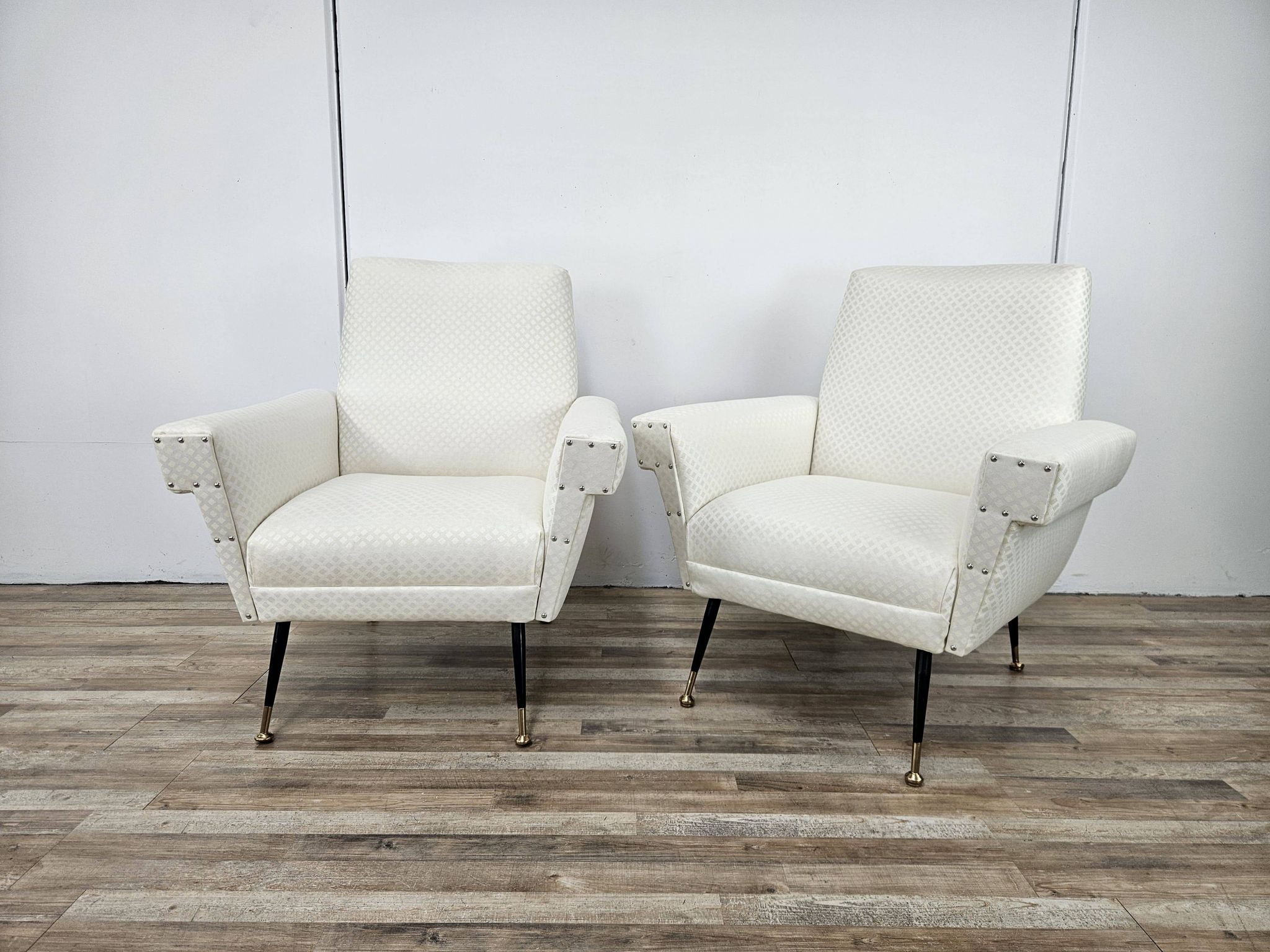 Italian armchairs from the 1950s in cream fabric with iron legs.
