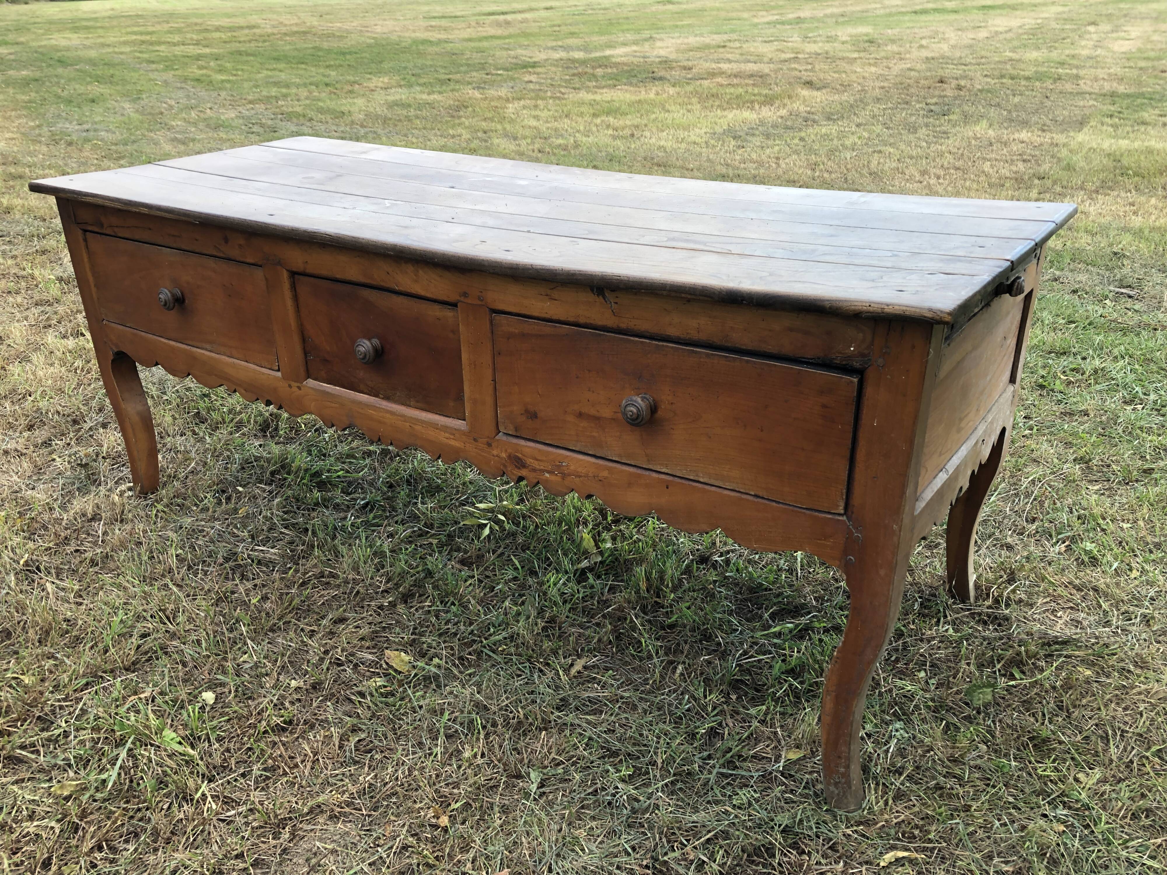 Antique Louis XV paneled table with 3 front drawers in solid cherry wood