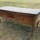 Antique Louis XV paneled table with 3 front drawers in solid cherry wood