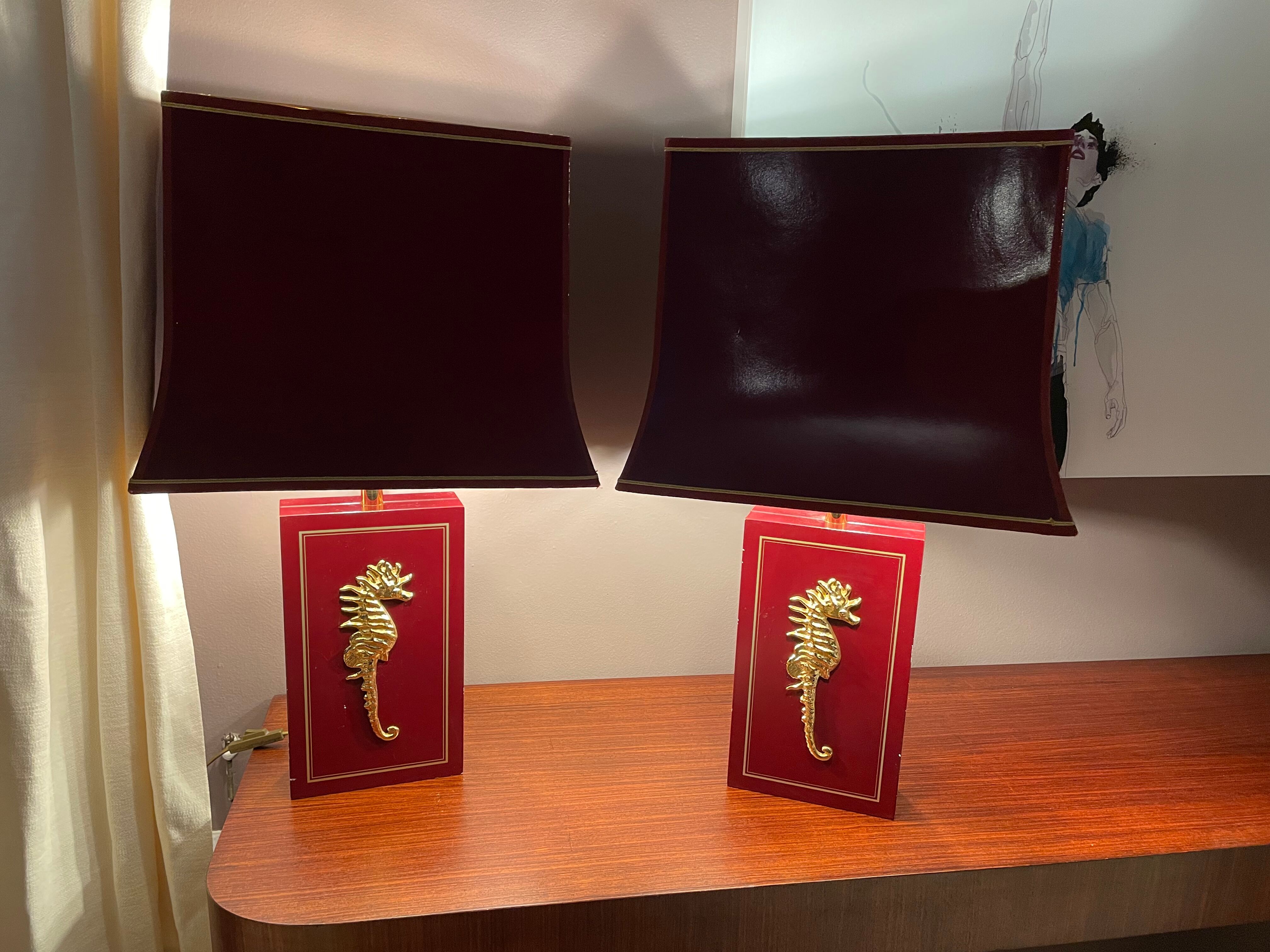 Pair of table lamps in Bordeaux lacquered wood and brass seahorse