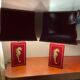 Pair of table lamps in Bordeaux lacquered wood and brass seahorse