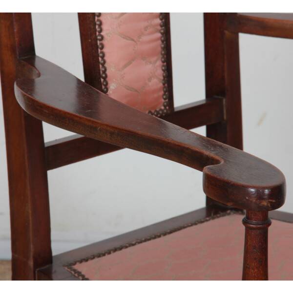 English armchair attributed to J.S. Henry, late 19th century.