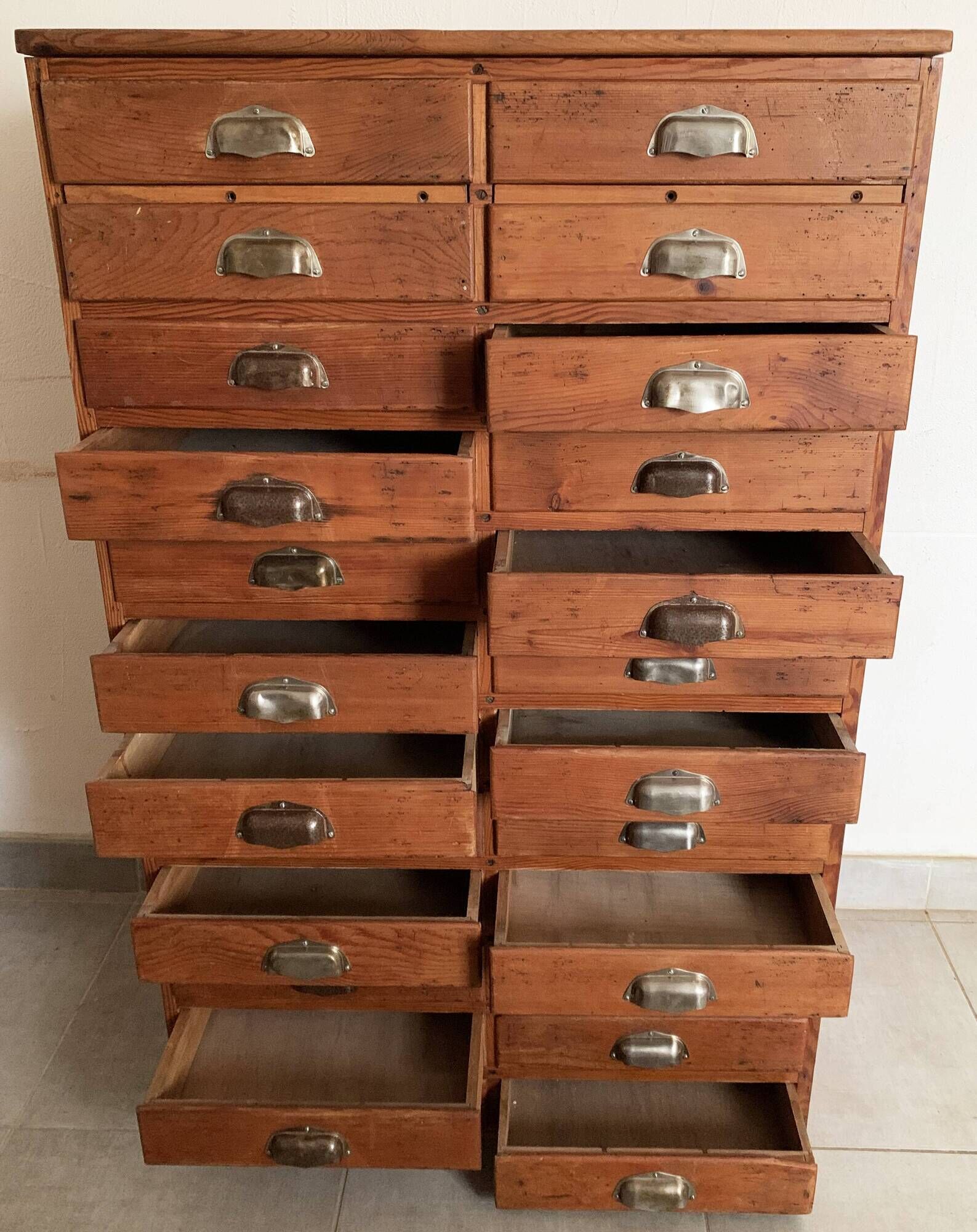 Old apothecary trade furniture in vintage wood 24 drawers.