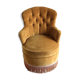 Fauteuil crapaud capitonné en velours jaune