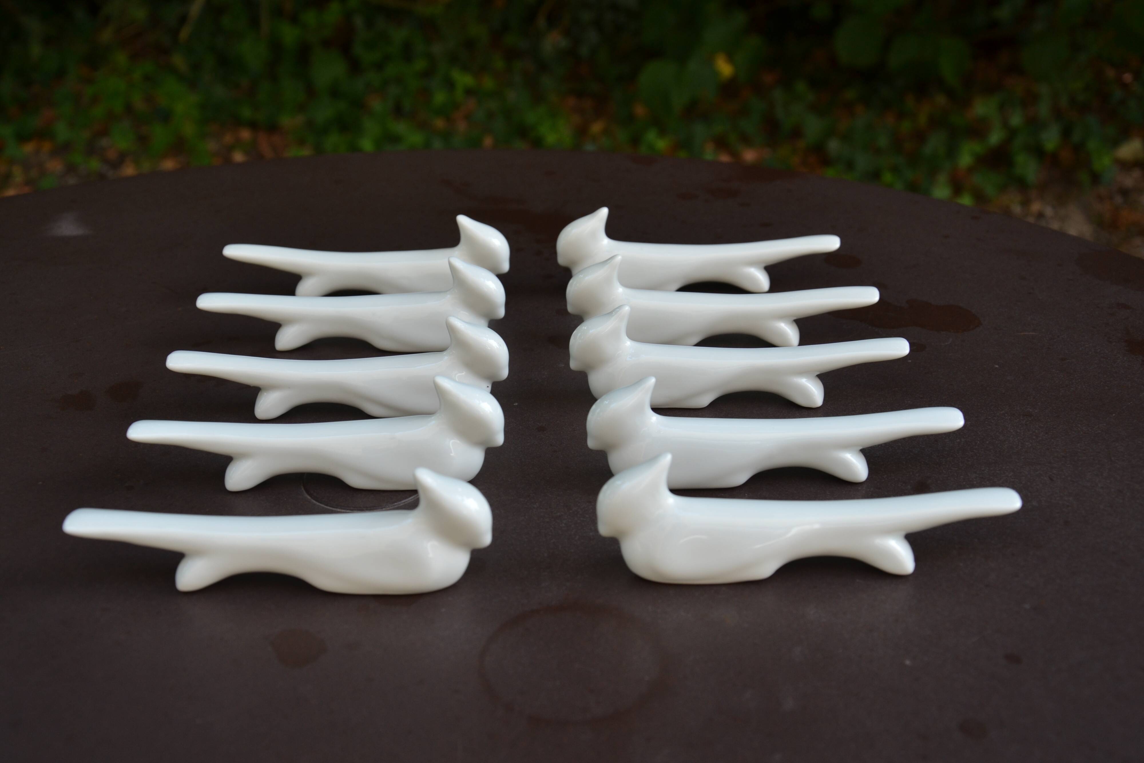 10 ceramic "bird" knife rests