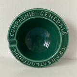 Beautiful ashtray of the Compagnie Générale Transatlantique in bottle green glazed earthenware