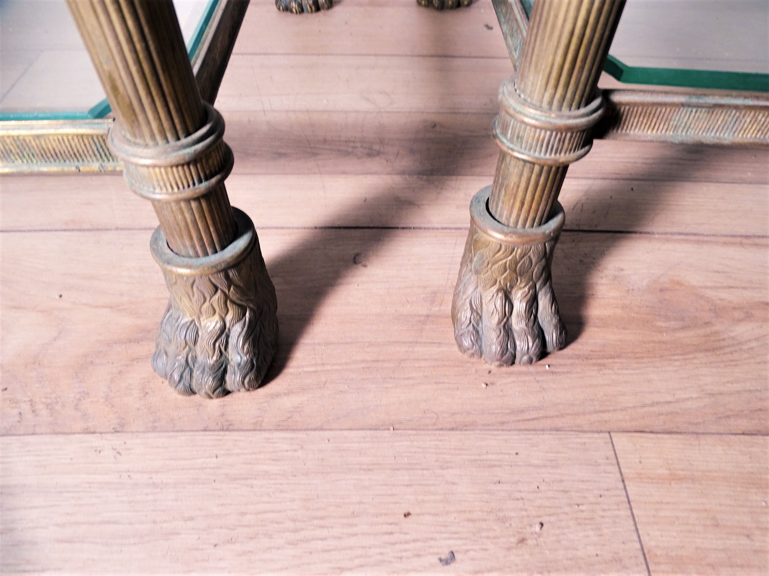 Pair of brass and gilded bronze shelves feet lion's feet