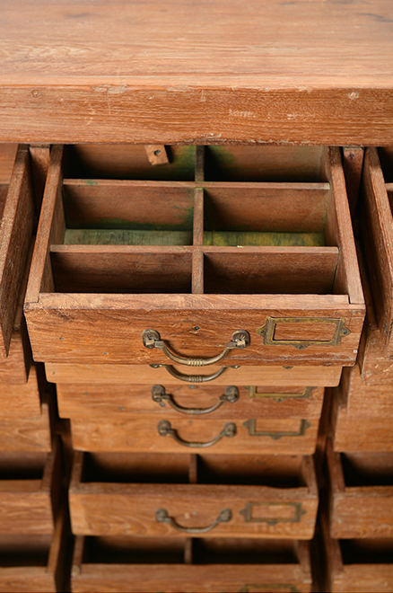 Old teak storage cabinet with 21 drawers