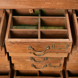 Old teak storage cabinet with 21 drawers