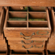 Old teak storage cabinet with 21 drawers