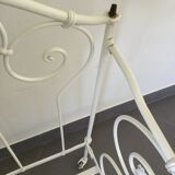 White wrought iron folding bed