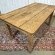 Extendable oak table from the 1930s with Gothic decoration.