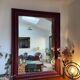 Large antique moulded mirror in wine red / plum (101 x 74 cm)