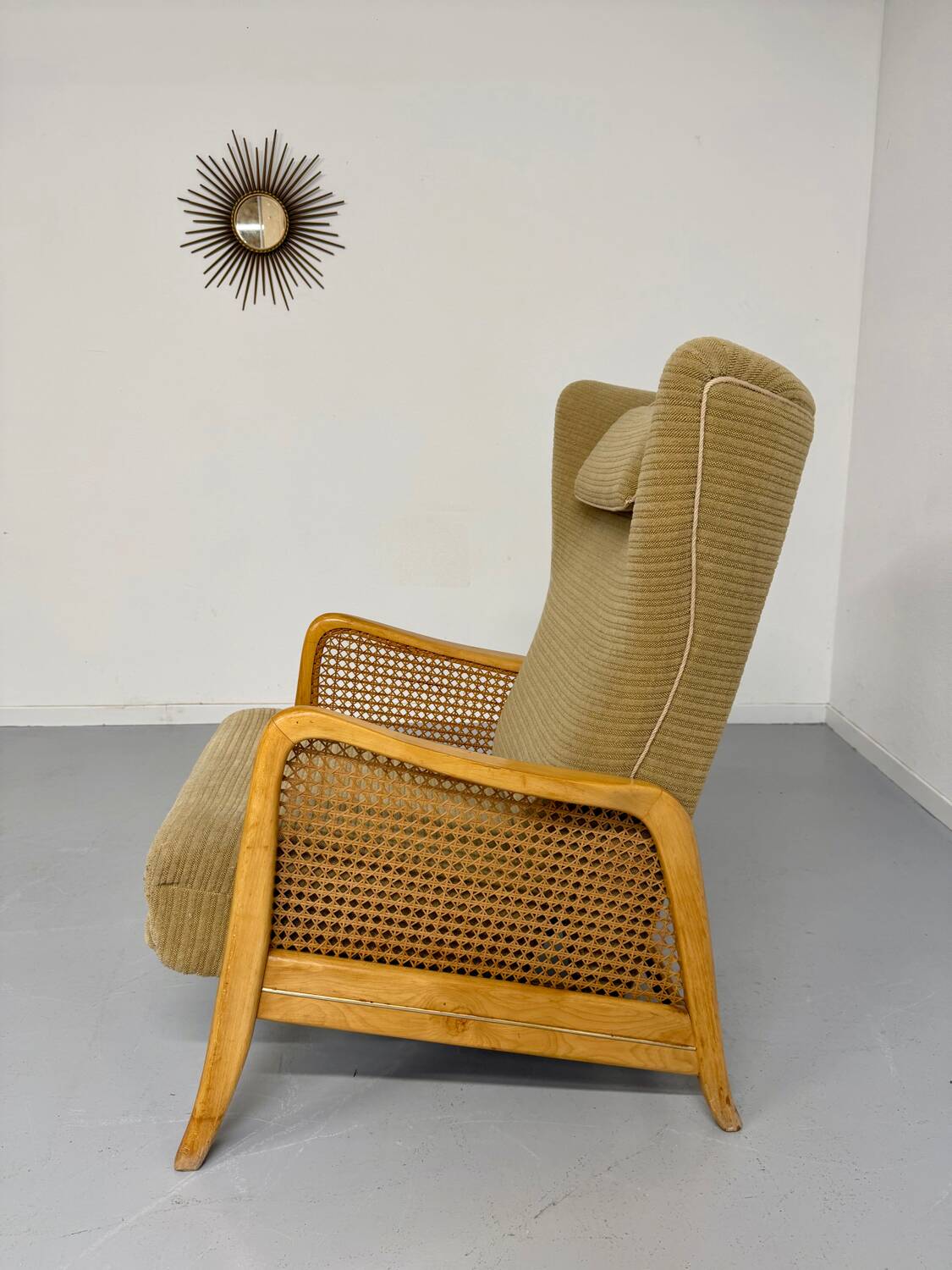 Vintage wingback recliner in Scandinavian design from the 1960s.