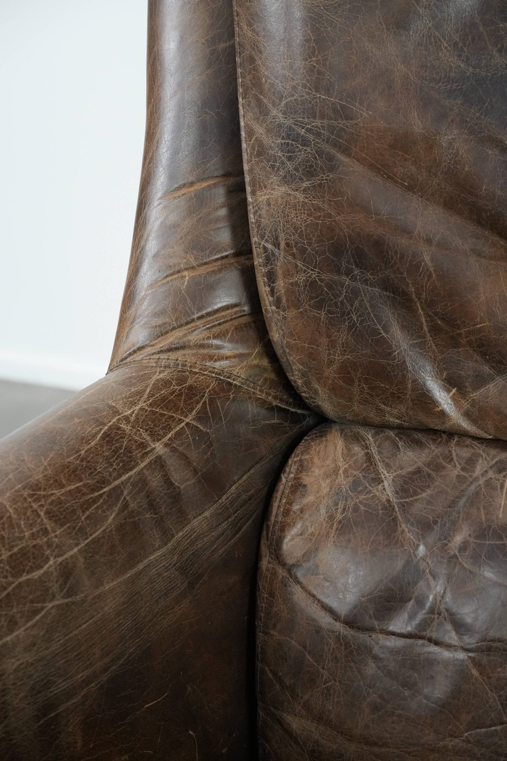 Very comfortable vintage cow leather armchair with beautiful colours