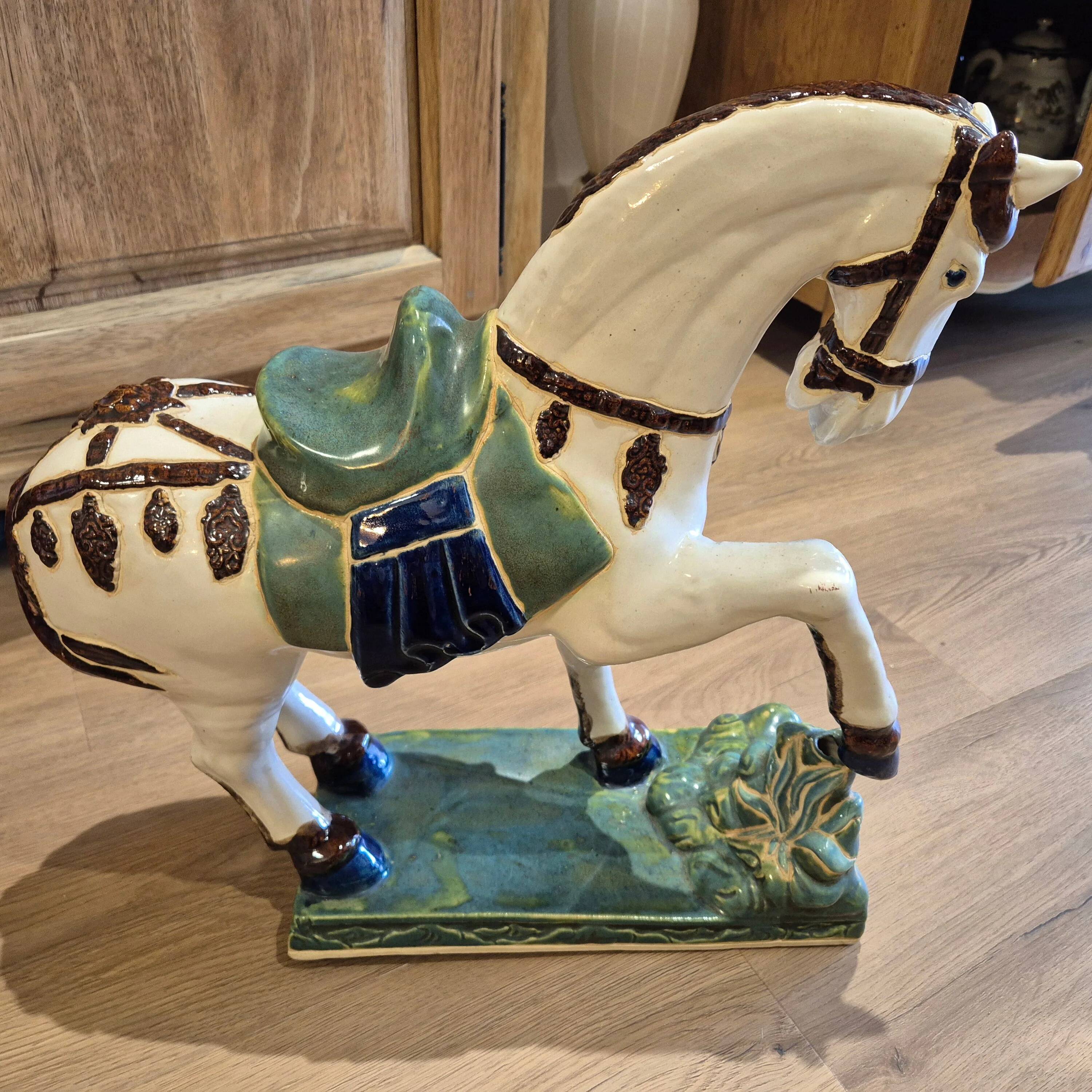 Ceramic horse statue