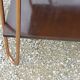 Vintage double wooden side table with copper base from the 50s
