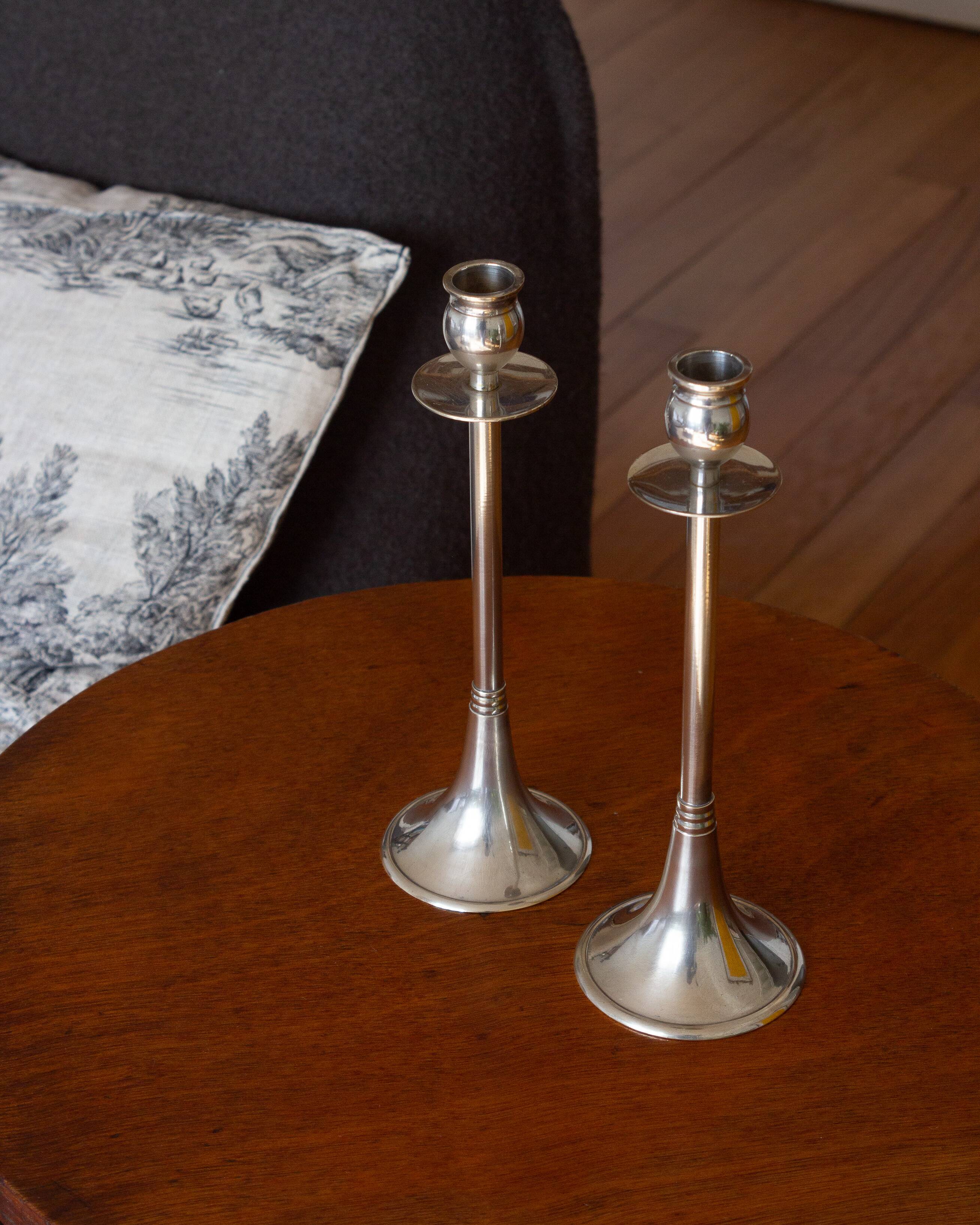 Duo of silver-plated brass candlesticks, 1950s/1960s