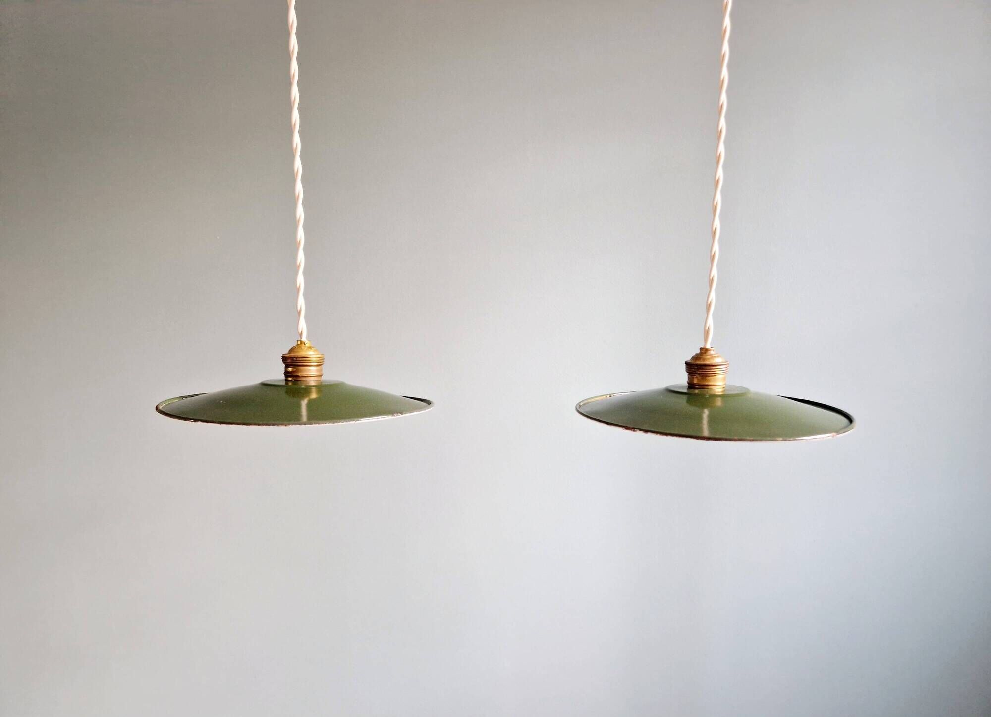 Pair of industrial pendant lights in green enamelled sheet metal