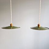 Pair of industrial pendant lights in green enamelled sheet metal