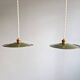 Pair of industrial pendant lights in green enamelled sheet metal