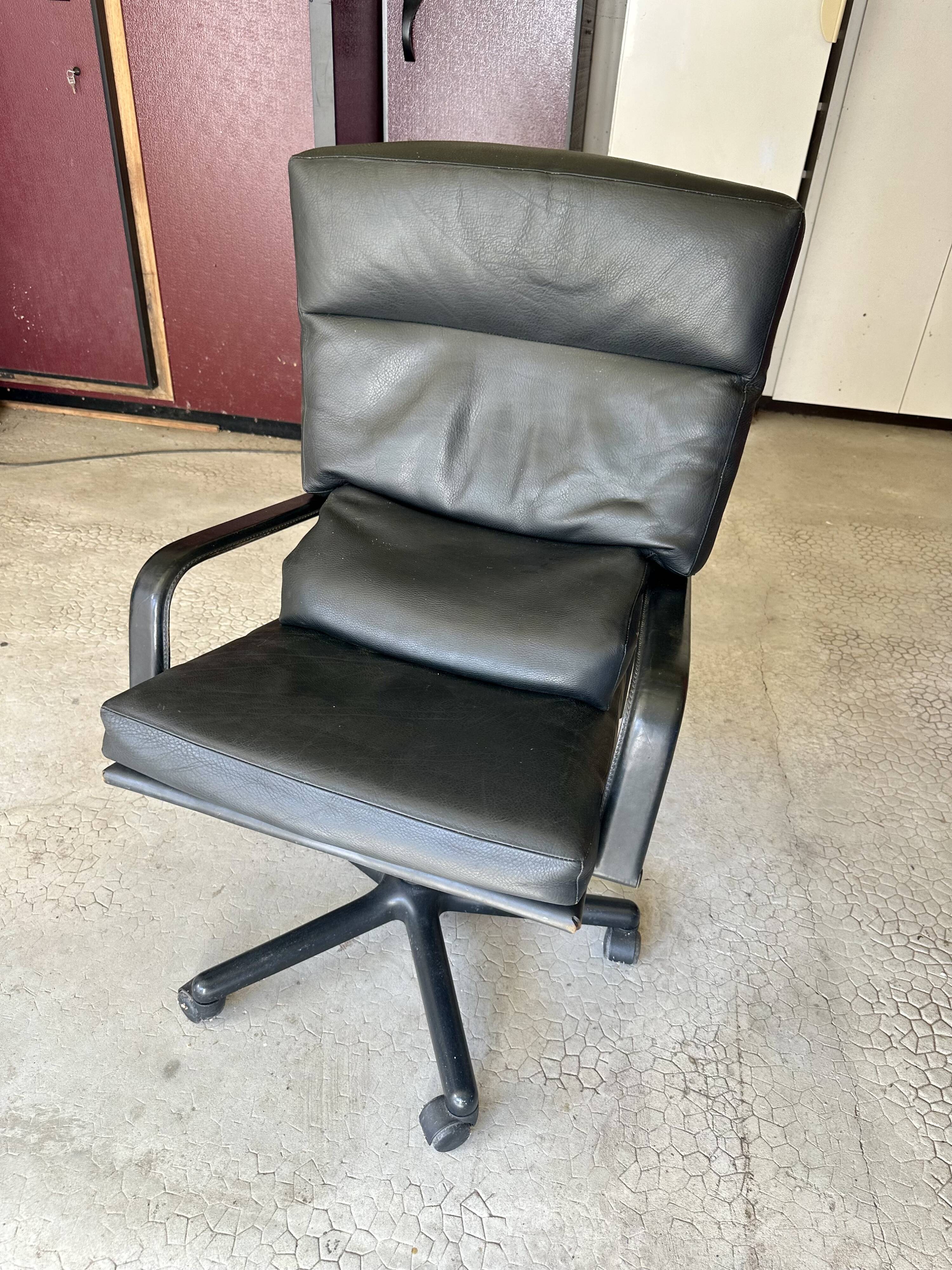 Executive desk by Guido Faleschini and armchair by Matteo Grassi